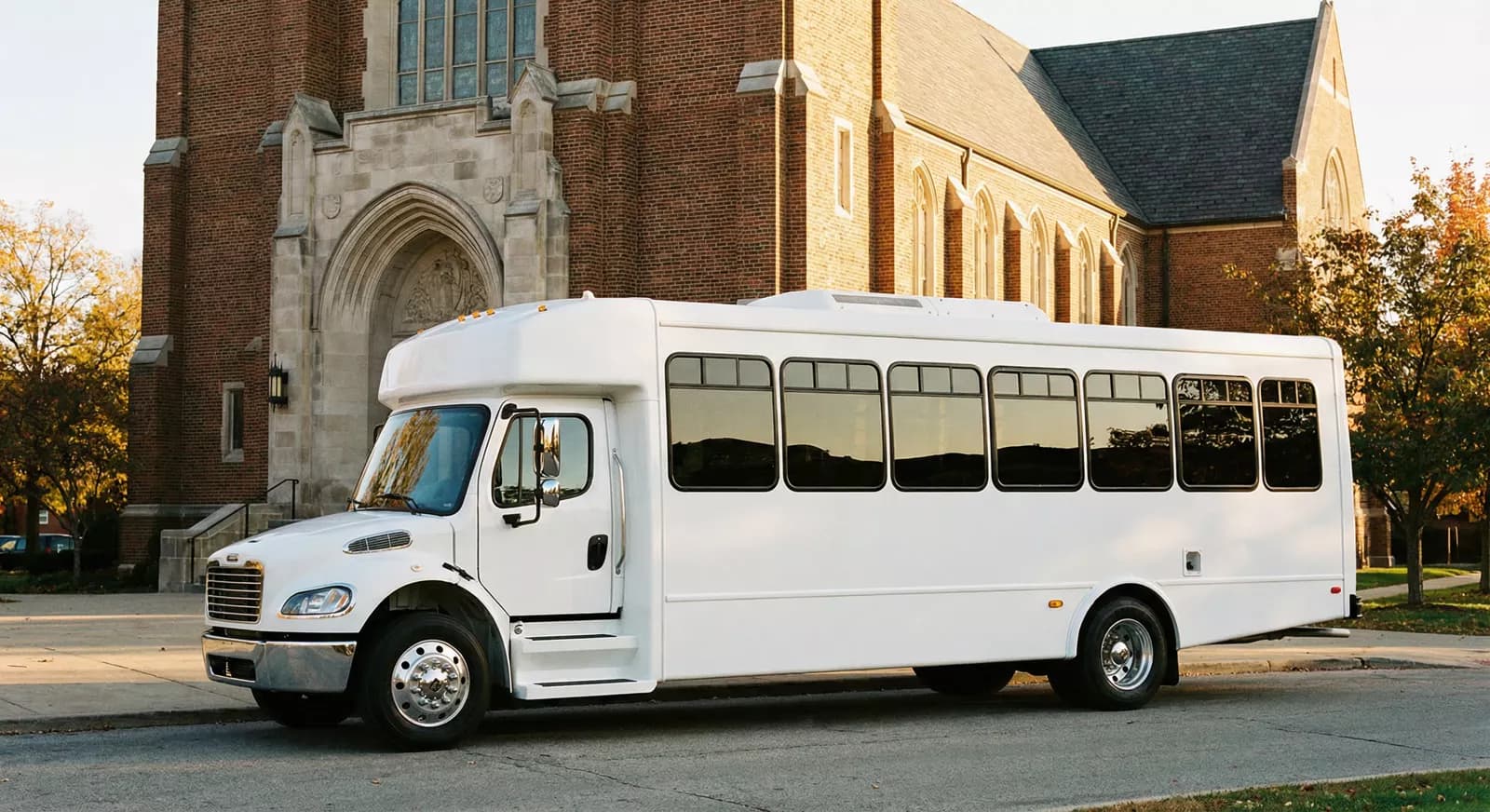 30 Passenger Coach Bus exterior — Denver Party Ride fleet (28–30 passengers)