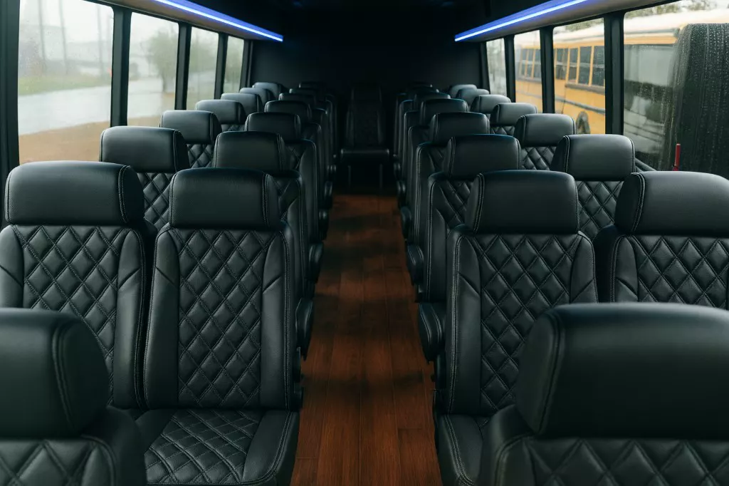32 Passenger Coach Bus interior — Denver Party Ride fleet (28–32 passengers)