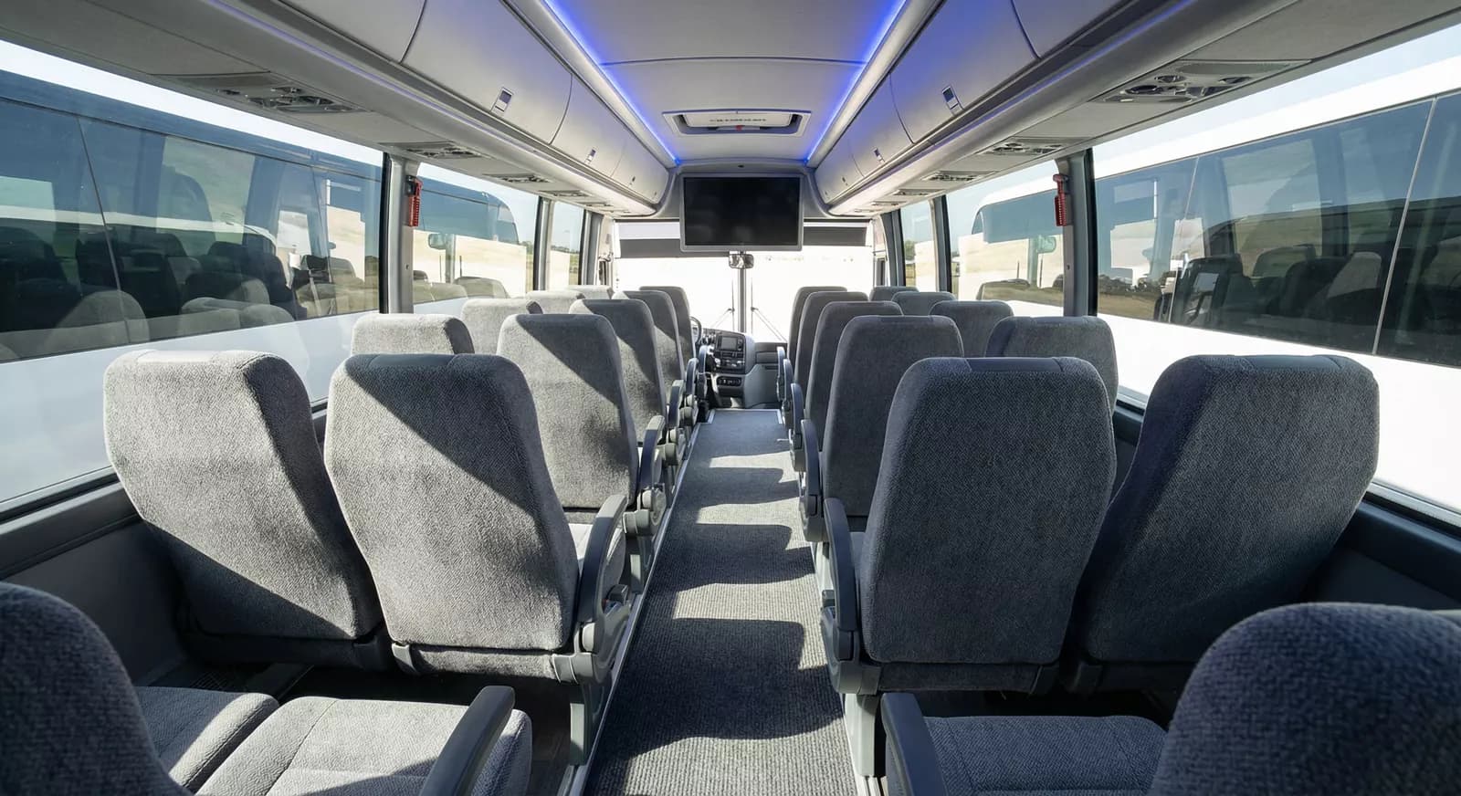 42 Passenger Coach Bus interior — Denver Party Ride fleet (40–42 passengers)