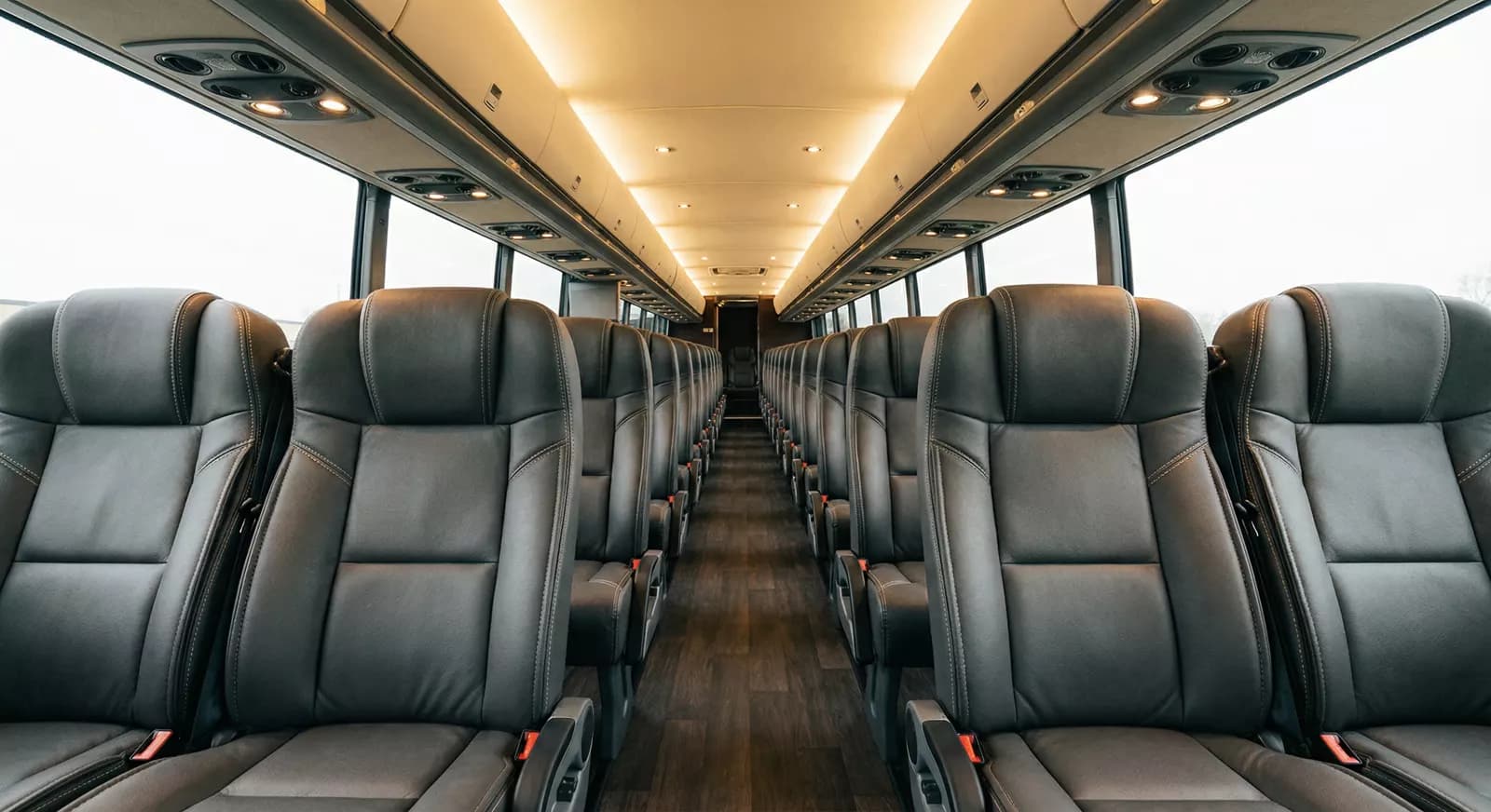 44 Passenger Coach Bus interior — Denver Party Ride fleet (42–44 passengers)