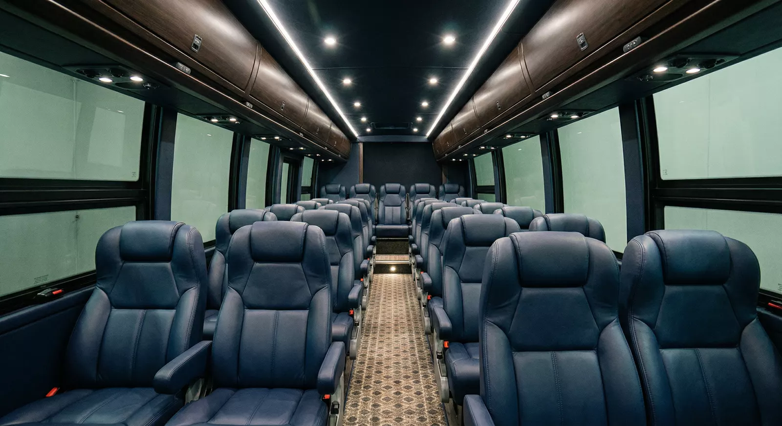 46 Passenger Coach Bus interior — Denver Party Ride fleet (44–46 passengers)