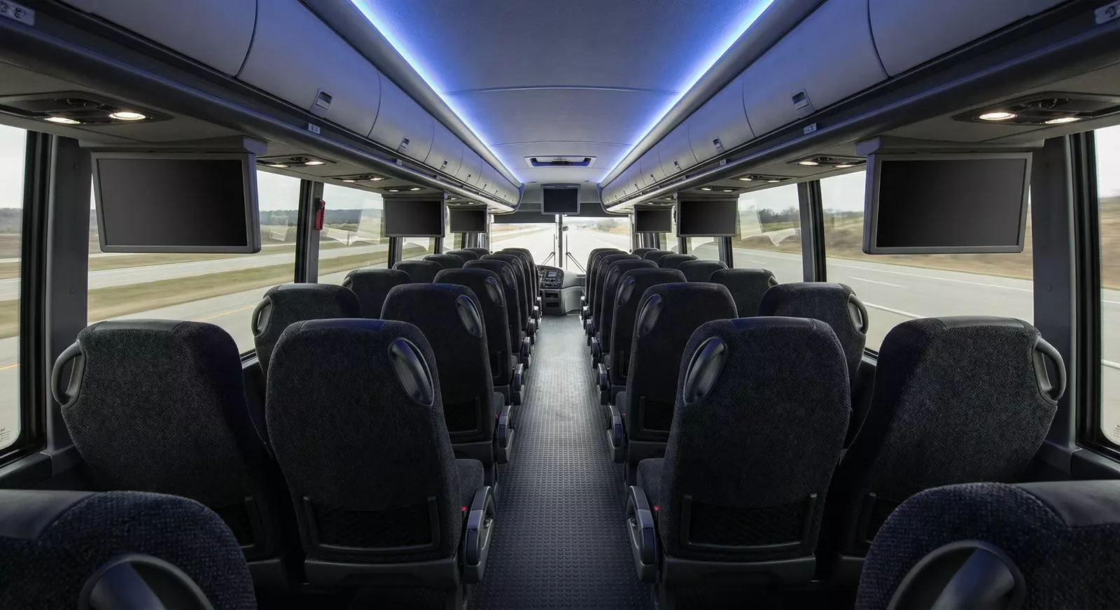 54 Passenger Coach Bus interior — Denver Party Ride fleet (52–54 passengers)